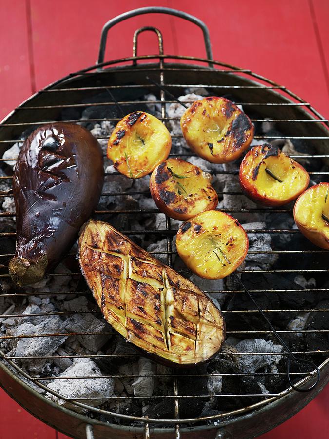 Peaches And Aubergines Cooked On The Barbecue Photograph by Atelier Mai 98
