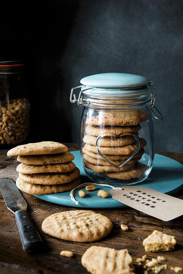 Peanut Butter Cookies In A Jar And And Next To It With A Label Photograph by Magdalena Hendey