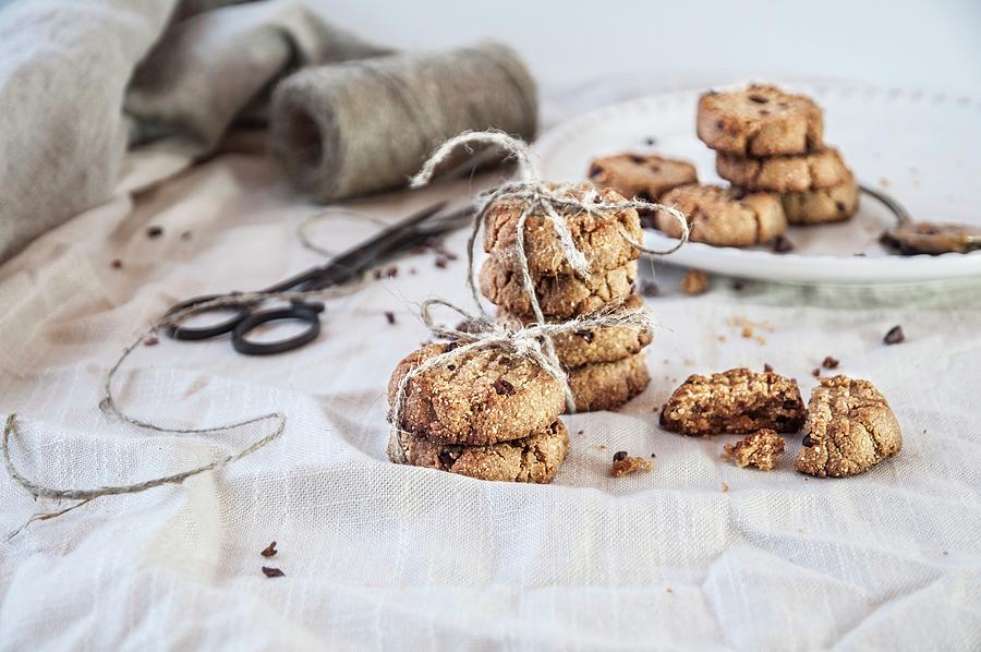 Peanut Butter Cookies With Cocoa Nibs Photograph by Healthylauracom
