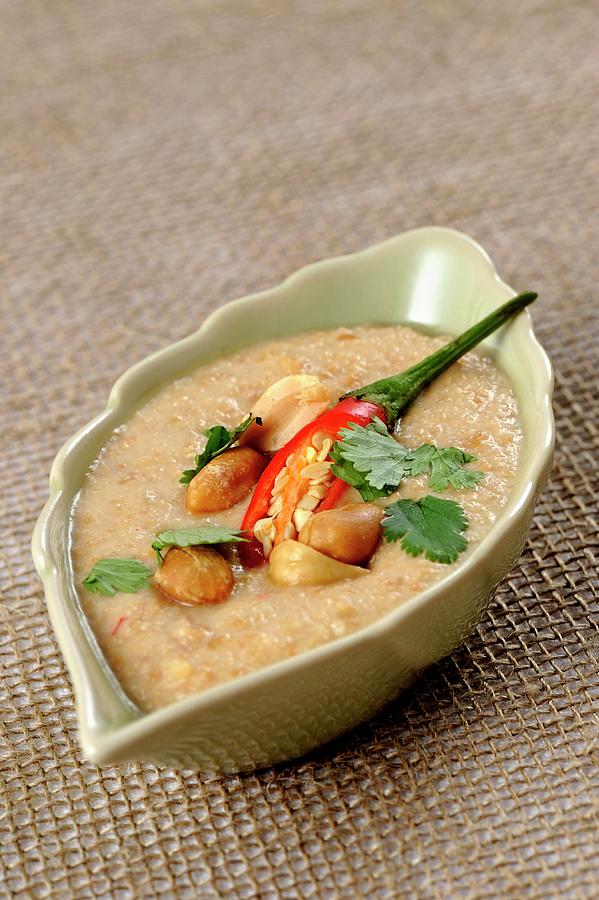 Peanut Sauce With Chilli And Coriander Photograph by Franco Pizzochero