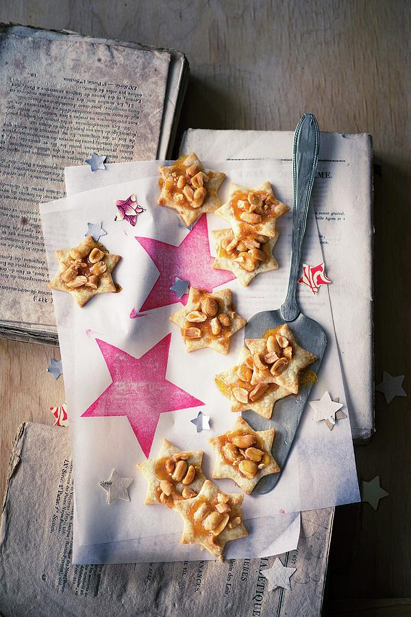 Peanut Stars On A Piece Of Paper Photograph by Jalag / Wolfgang Schardt