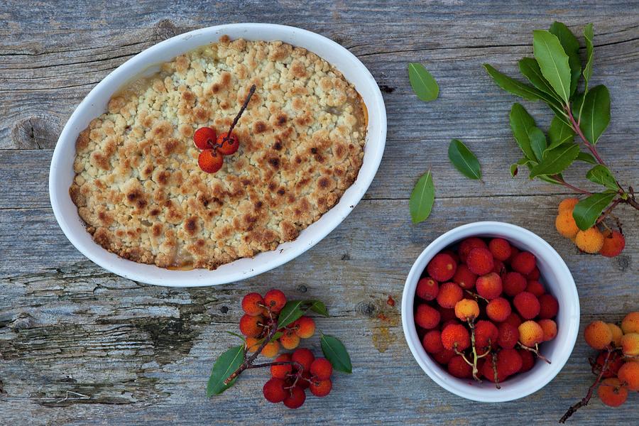 Pear And Apple Crumble With Strawberry Tree Fruit Photograph by Isolda Delgado Mora