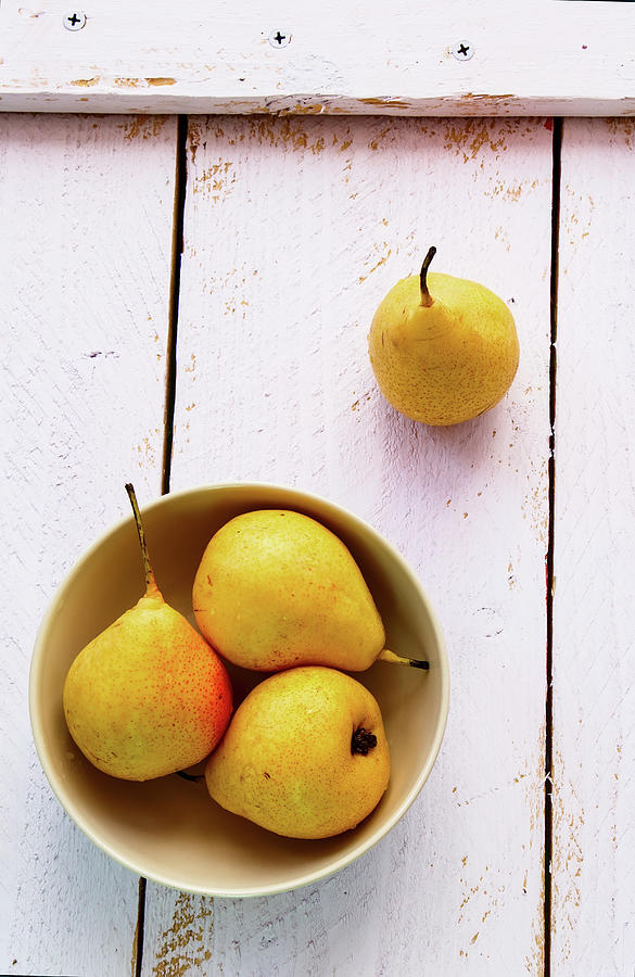 Pears In A Bowl On A Wooden Background top View Photograph by Yuliya Gontar