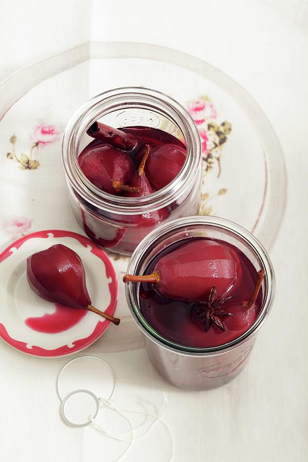 Pears In Red Wine With Spices In Preserving Jars Photograph by Peter Garten