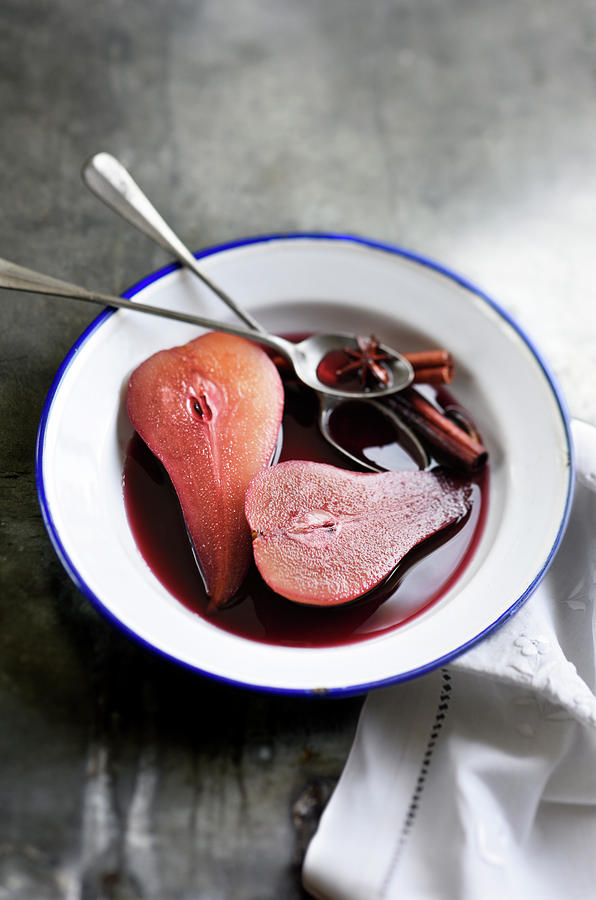 Pears In Wine Photograph by Ploton
