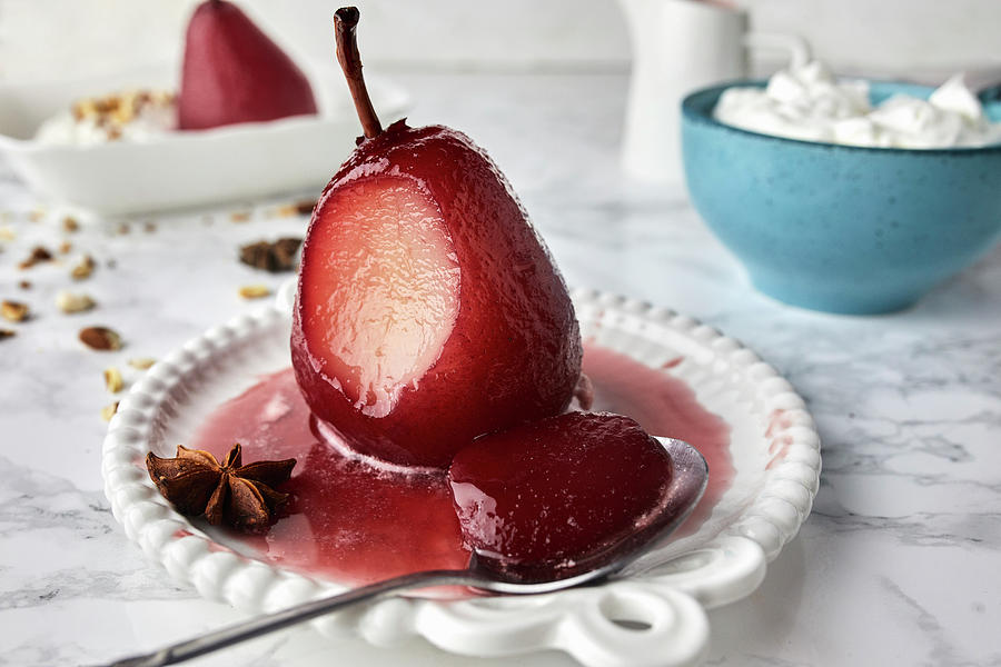 Pears Poached In Red Wine Sauce With Spices Served With Mascarpone And Cream Photograph by Natasa Dangubic