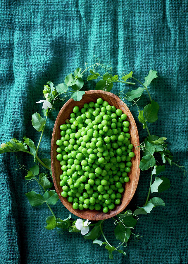 Peas In A Wooden Bowl With A Leaf Wreath Photograph by Great Stock!