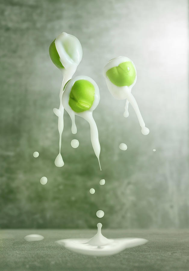 Peas With A Splash Of Milk Photograph by Krger & Gross