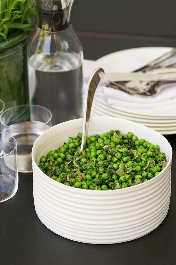 Peas With Bacon And Herbs Photograph by Tim Winter