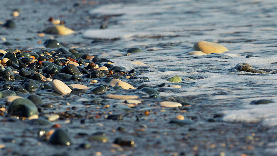 Pebbles And Sea Photograph