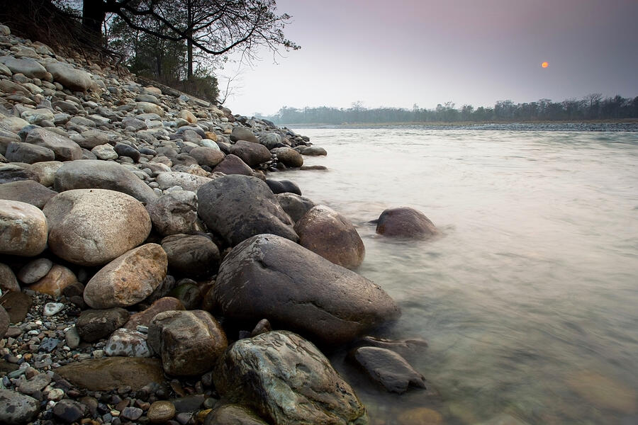 Pebbles On The Shore Of River, Manas National Park Unesco Photograph by Sandesh Kadur / Naturepl.com Pebbles On The Shore Of River, Manas National Park Unesco Photograph by Sandesh Kadur / Naturepl.com