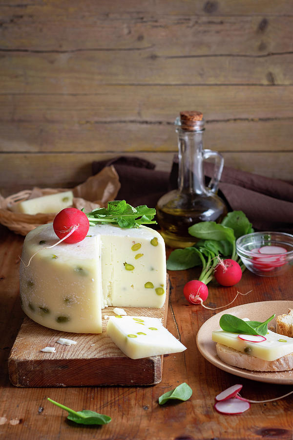 Pecorino Cheese And Fresh Radishes Photograph by Alice Del Re