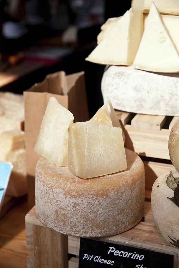 Pecorino Cheese On A Market Stall Photograph by George Blomfield