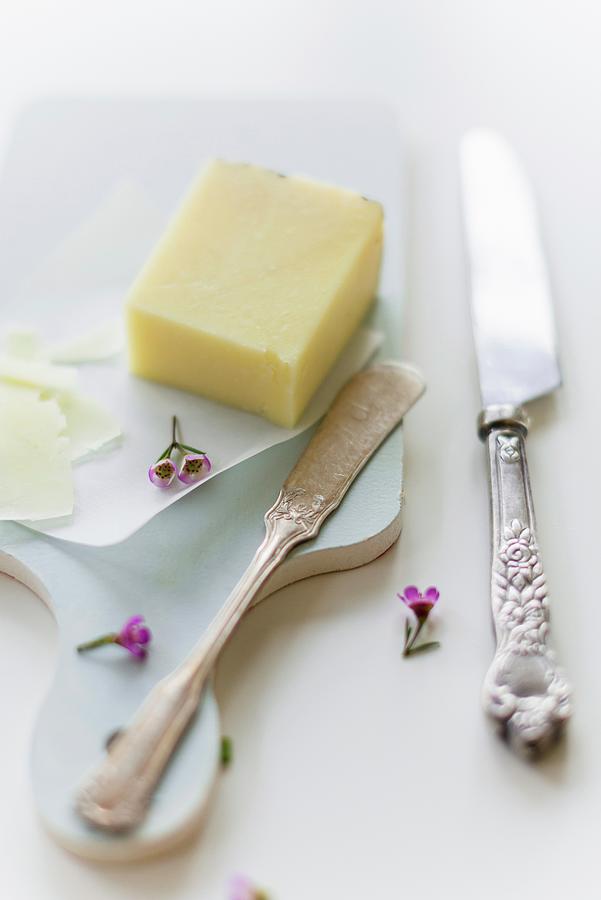 Pecorino Cheese With A Knife On A Chopping Board Photograph by Au Petit Gout Photography Llc