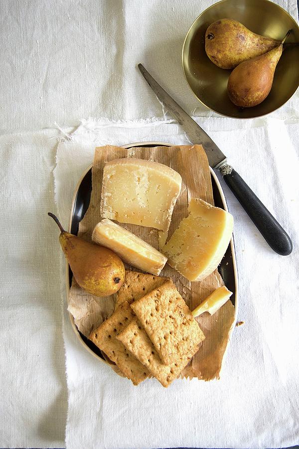 Pecorino Cheese With Pears And Crackers Photograph by Patricia Miceli
