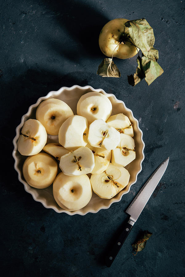 Peeled And Halved Apples For Crumble Photograph by Justina Ramanauskiene