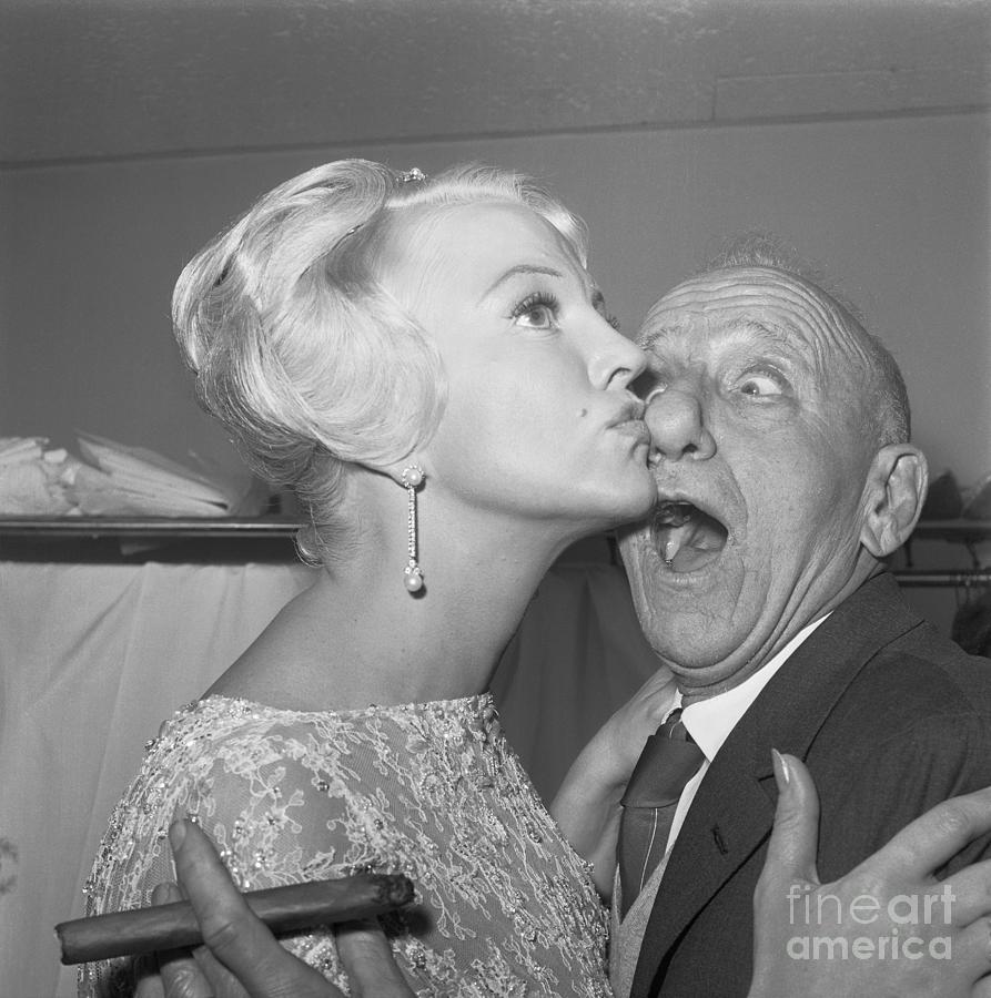 Peggy Lee Kissing Jimmy Durante On Nose Photograph by Bettmann