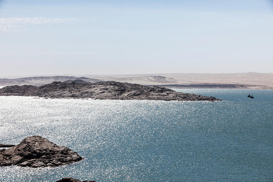 Nature Photograph - Penguin Island And Seal Island, Desert In The Background, Luederitz, Karas, Namibia. by Wilfried Feder