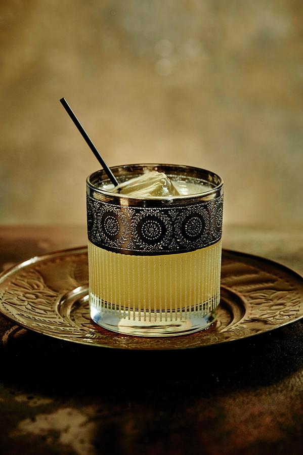 Penicillin Cocktail Made With Candied Ginger, Scotch Whisky And Lemon Juice Photograph by Greg Rannells