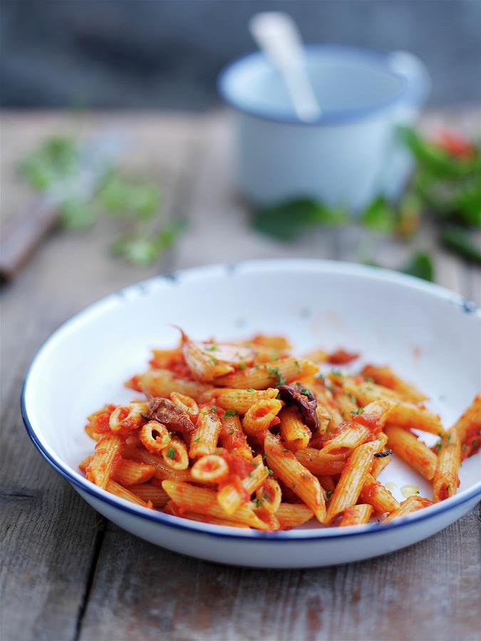 Penne Allarrabbiata pasta With Spicy Bacon And Tomato Sauce, Italy Photograph by Garlick, Ian