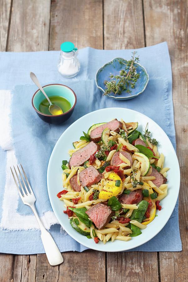 Penne Pasta Salad With Roast Beef, Courgettes, Dried Tomatoes And Spinach Photograph by Rua Castilho