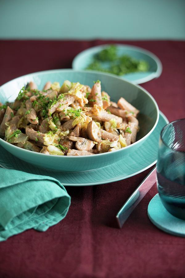 Penne Pasta With Chinese Cabbage And Creamy Mushroom Sauce Photograph by Joerg Lehmann