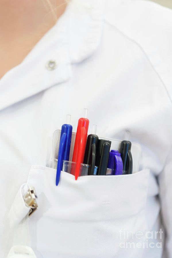 Pens In A Nurses Pocket Photograph by Arno Massee/science Photo Library