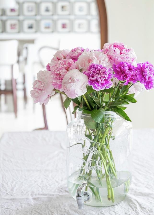 Peonies And Carnations In Glass Jar Photograph by Emma Friedrichs