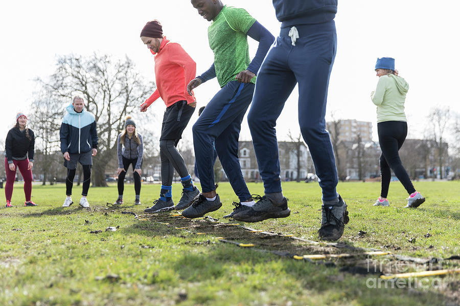 People Exercising In Park Photograph by Caia Image/science Photo Library