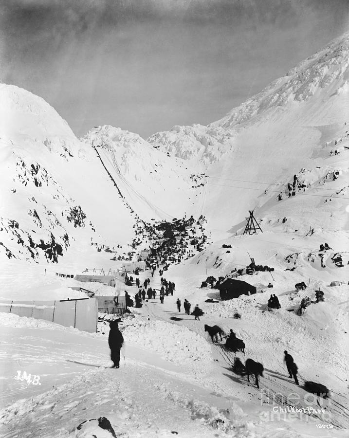 People In A Mountain Pass Photograph by Bettmann