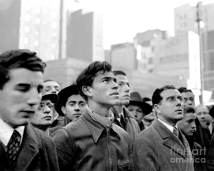 People In Times Square Listen To A Photograph by New York Daily News Archive