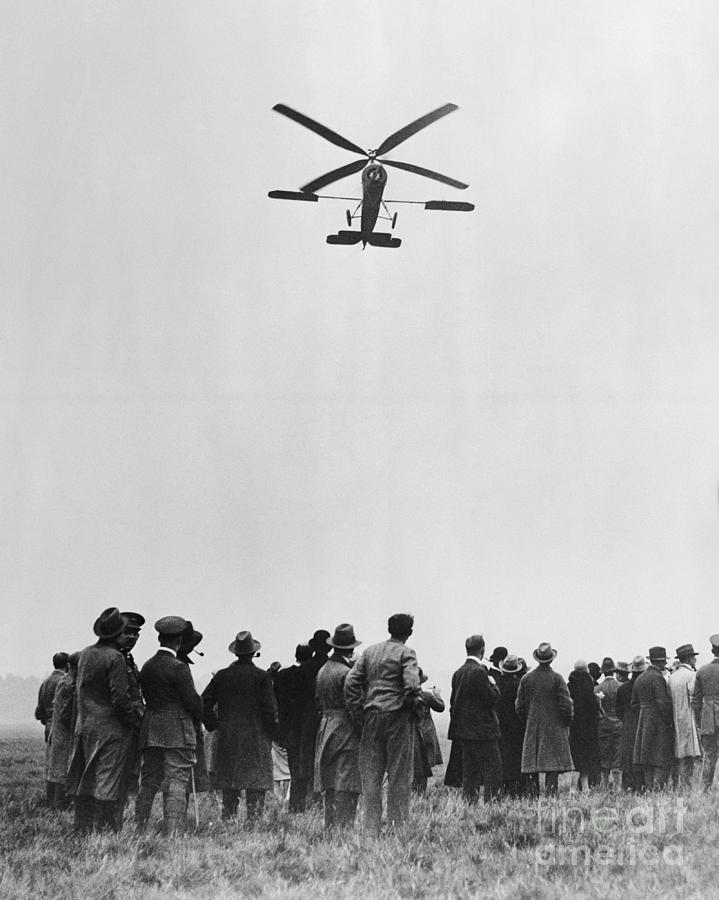 People Looking At A Helicopter Photograph by Bettmann
