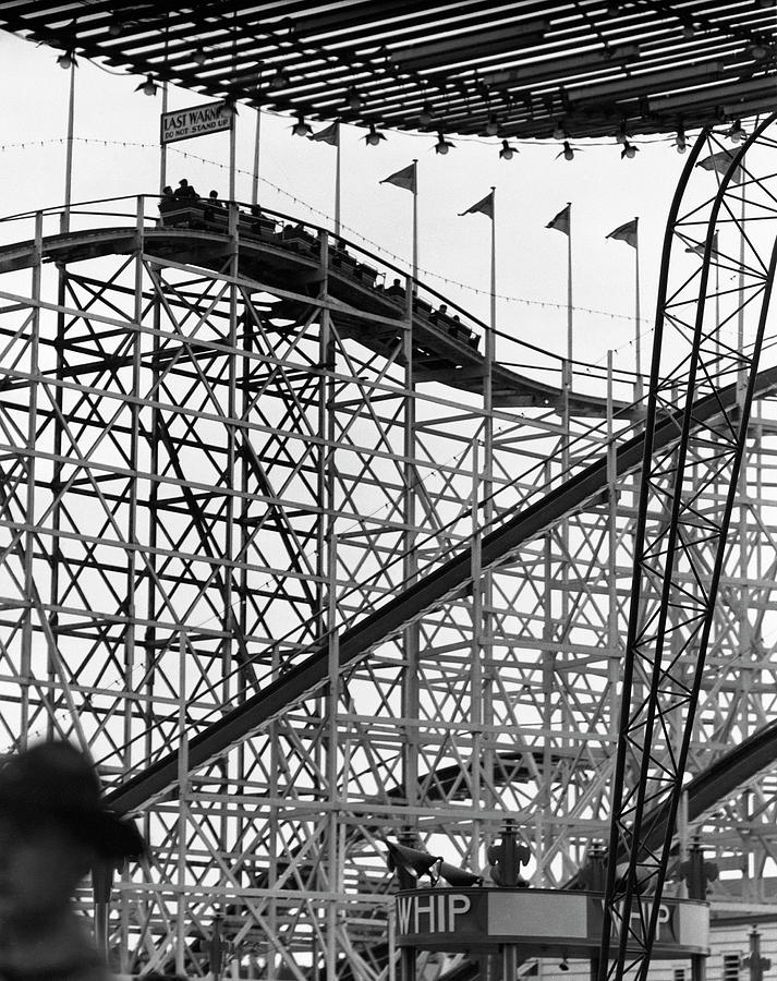 People On Roller Coaster Photograph by George Marks