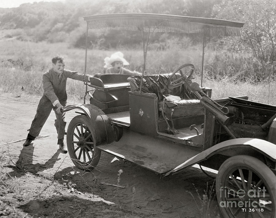 People Pushing An Old Auto Photograph by Bettmann
