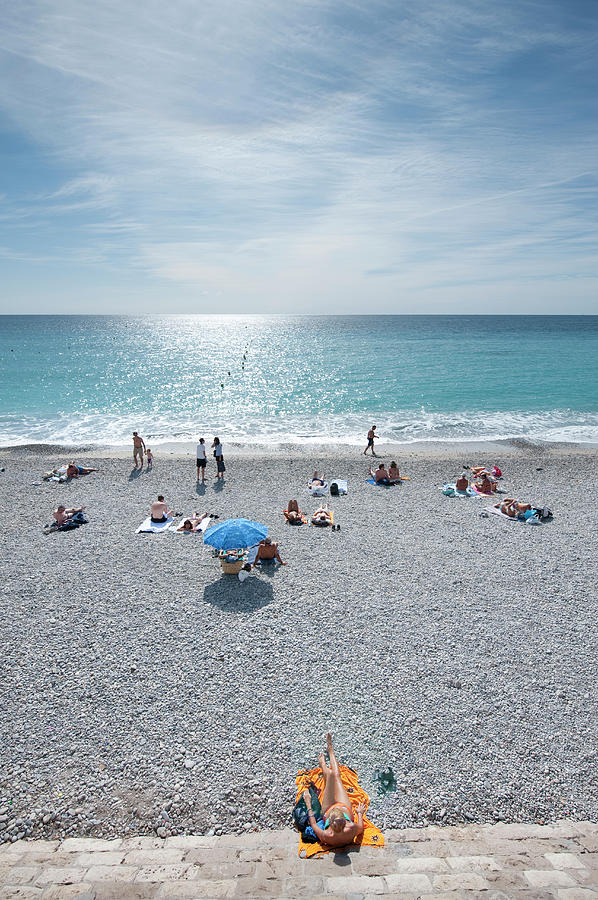 People Relaxing On Beach Near Opera Photograph by Thomas Winz