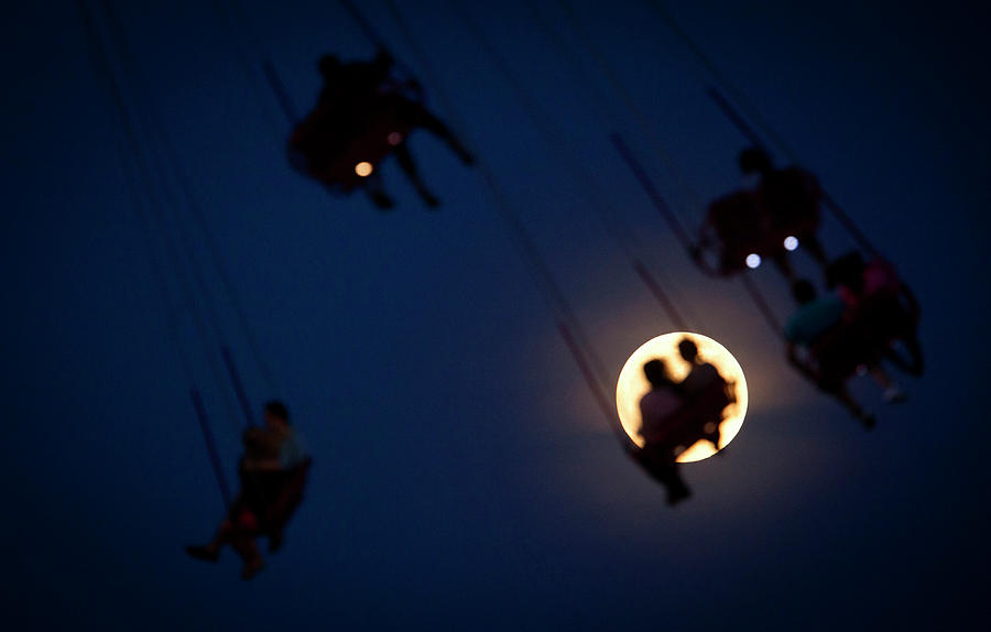 People Ride the Luna Park Swing Ride Photograph by Carlo Allegri - Fine ...