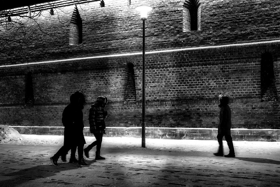 People Walking At Night On Snowy Streets Photograph by Vasil Nanev
