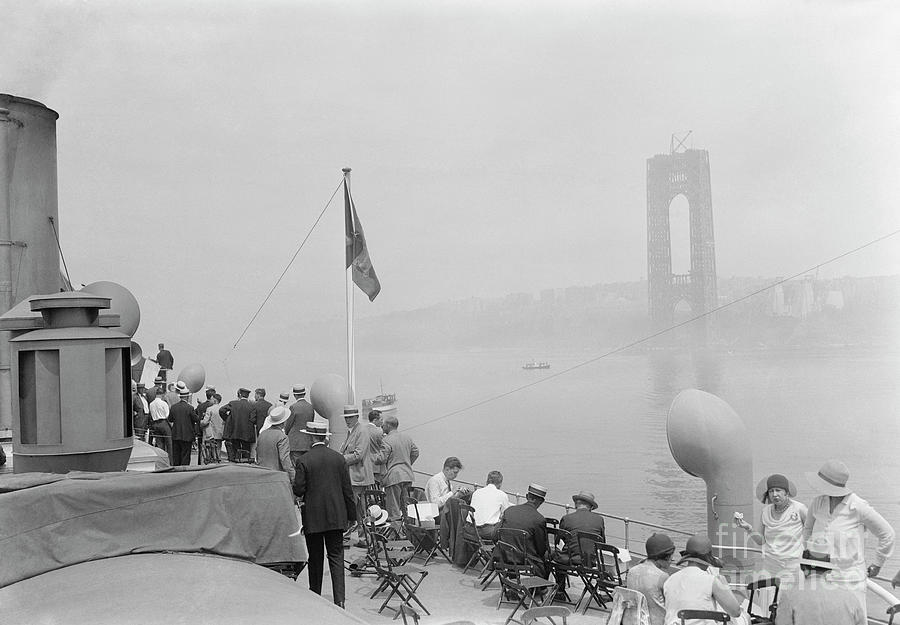 People Watching Bridge Cables Photograph by Bettmann