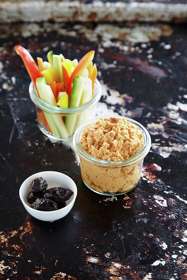 Pepper Hummus In A Glass Served With Julienned Vegetables To Dip Photograph by Rafael Pranschke