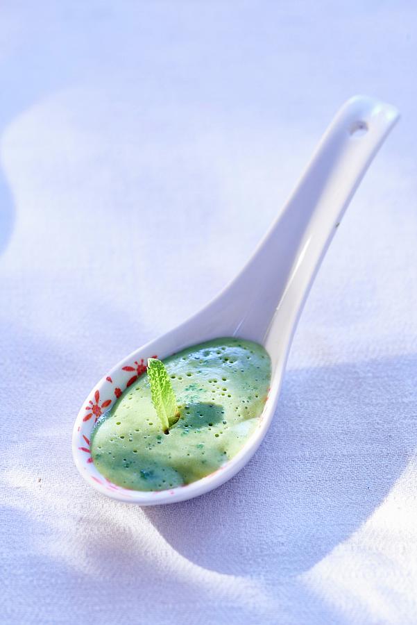 Peppermint Cream On A Tasting Spoon Photograph by Bernhard Winkelmann