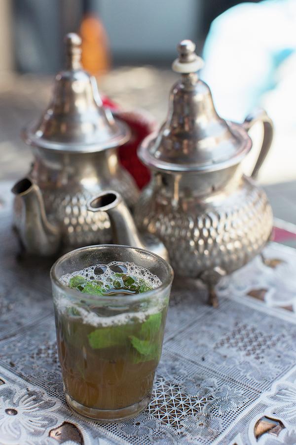 Peppermint Tea In Silver Pots And A Glass Photograph by Carine Lutt