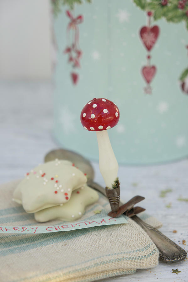 Peppernuts And A Toadstool-shaped Vintage Christmas Tree Decoration Photograph by Martina Schindler
