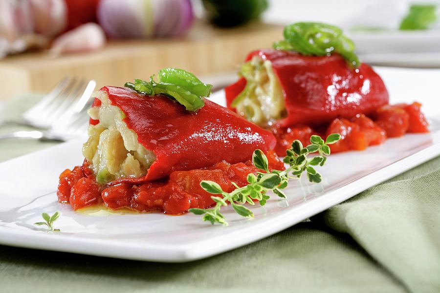 Peppers Stuffed With Cod On Stewed Tomatoes Photograph by Gastromedia
