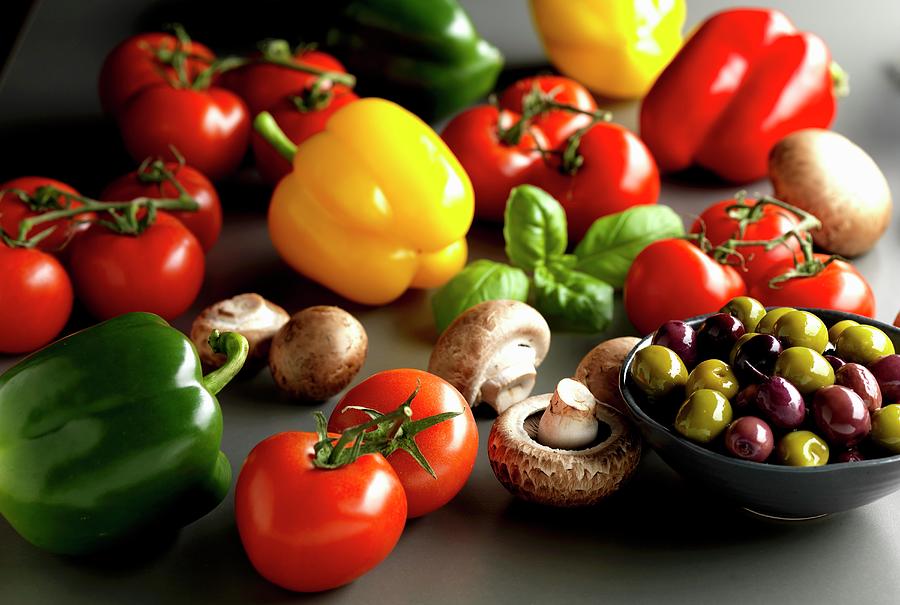Peppers, Tomatoes, Mushrooms, Basil And Olives Photograph by Robert Morris