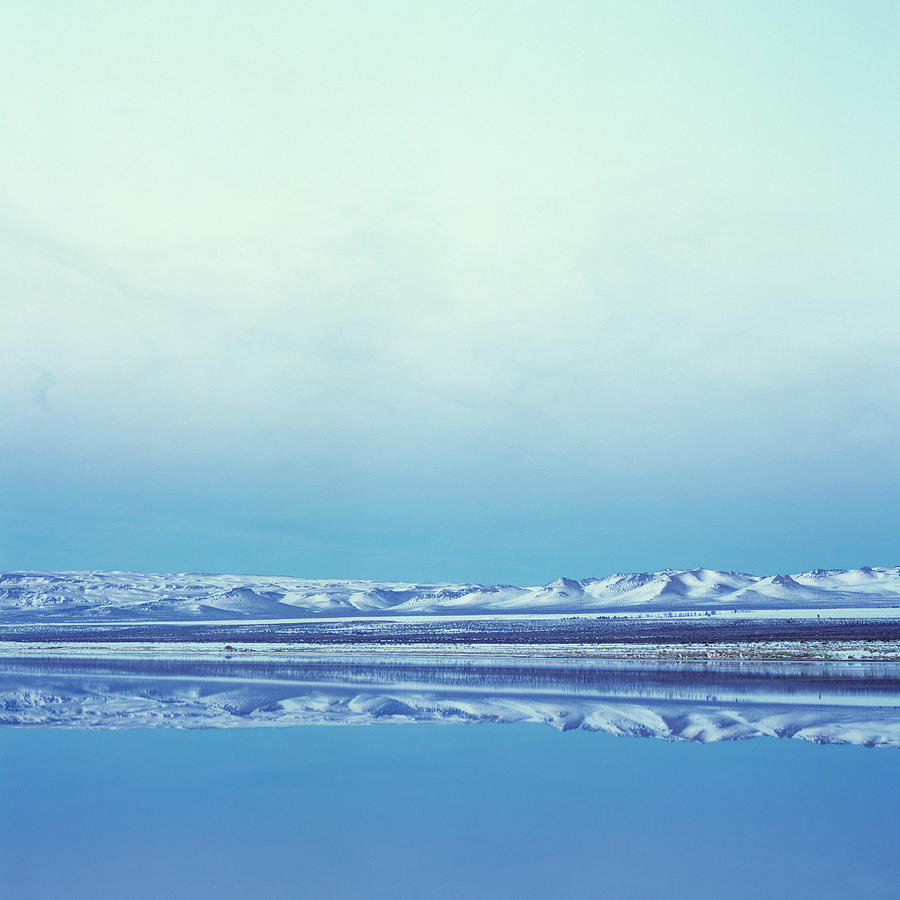Perfect Reflection Of Snowy  Mountains Photograph by Micha Pawlitzki