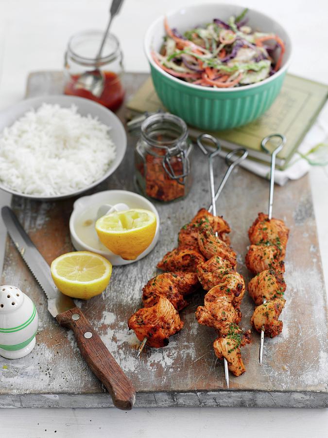 Peri-peri Chicken Kebabs With Rice And Colourful Coleslaw Photograph by ...