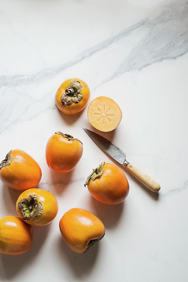 Persimmons Photograph by Miriam Garcia
