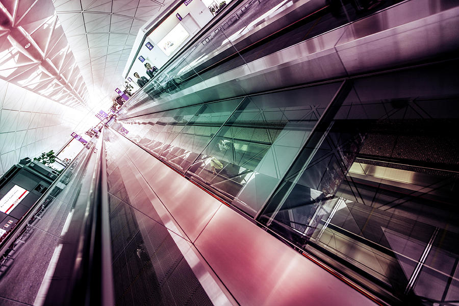Perspective Of Airport Escalators Photograph by Merten Snijders