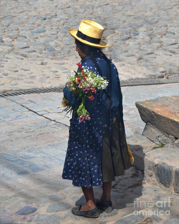 Peruvian Woman Holding Flowers in Ollantaytambo Photograph by Catherine Sherman