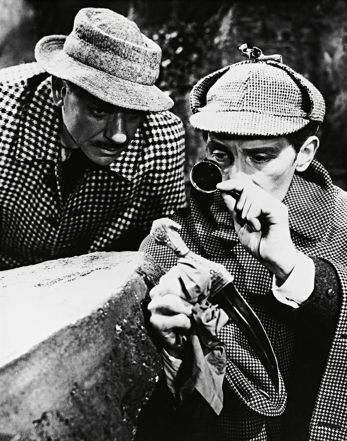 Sherlock Holmes Photograph - PETER CUSHING and ANDRE MORELL in THE HOUND OF THE BASKERVILLES -1959-. by Album